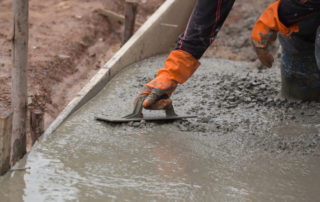 contractor installing concrete