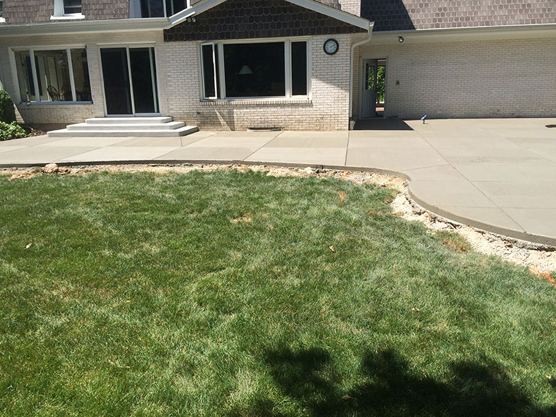 fox-point-concrete-patio4 Backyard concrete patio with grass fox point