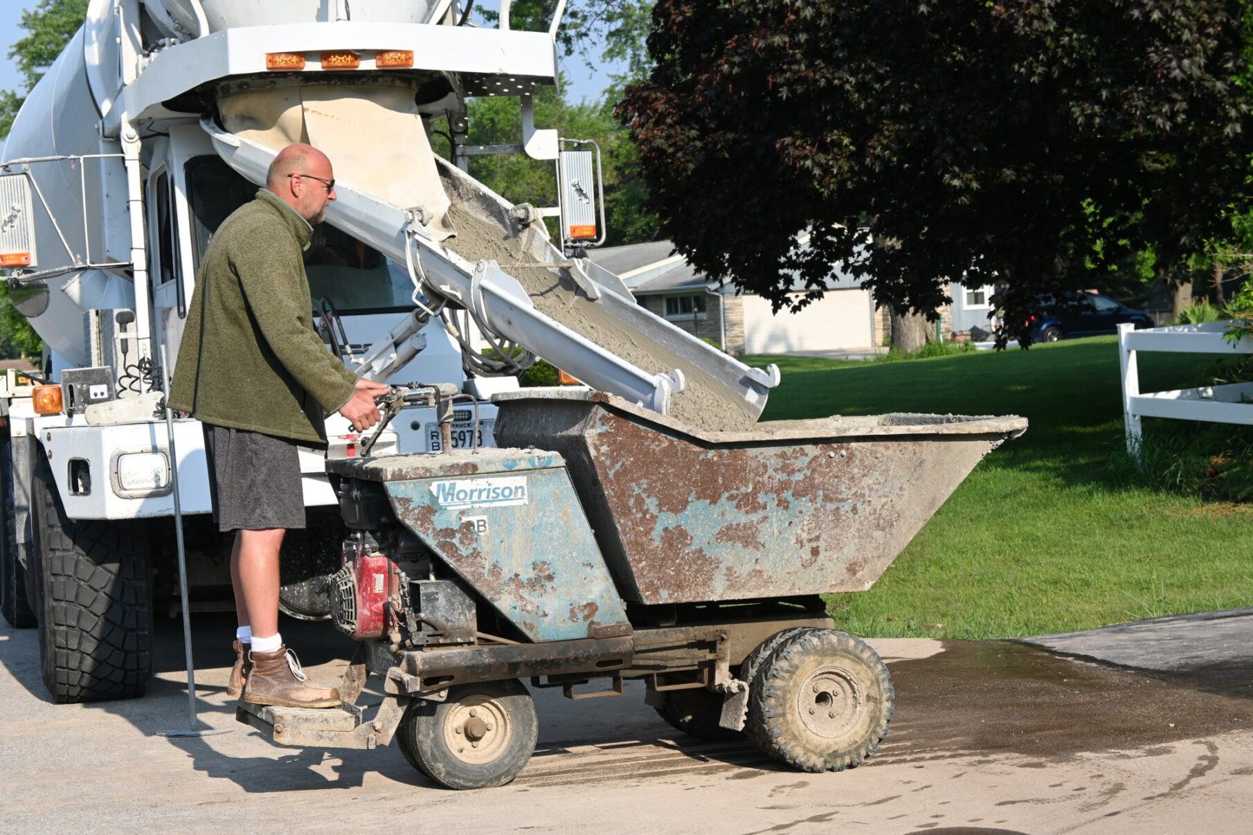 Moving fresh concrete from the ready-mix truck.